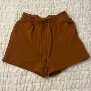 Orange Lululemon shorts
